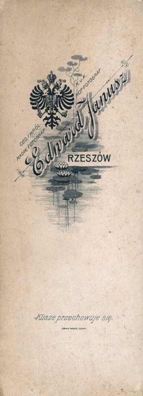 Winieta z logo firmy E. Janusza.Muzeum Historii Miasta Rzeszowa